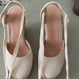 Round-toe canvas espadrille wedges.